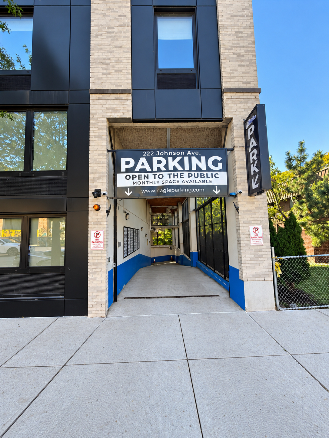 Parking entrance and signs at 222 Johnson Avenue